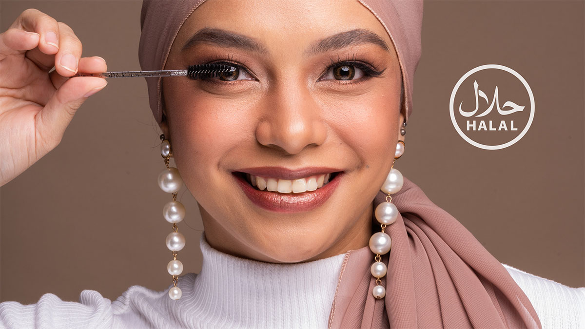a muslim woman holding a makeup product
