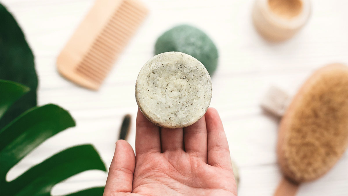 a hand holding a sustainable soap