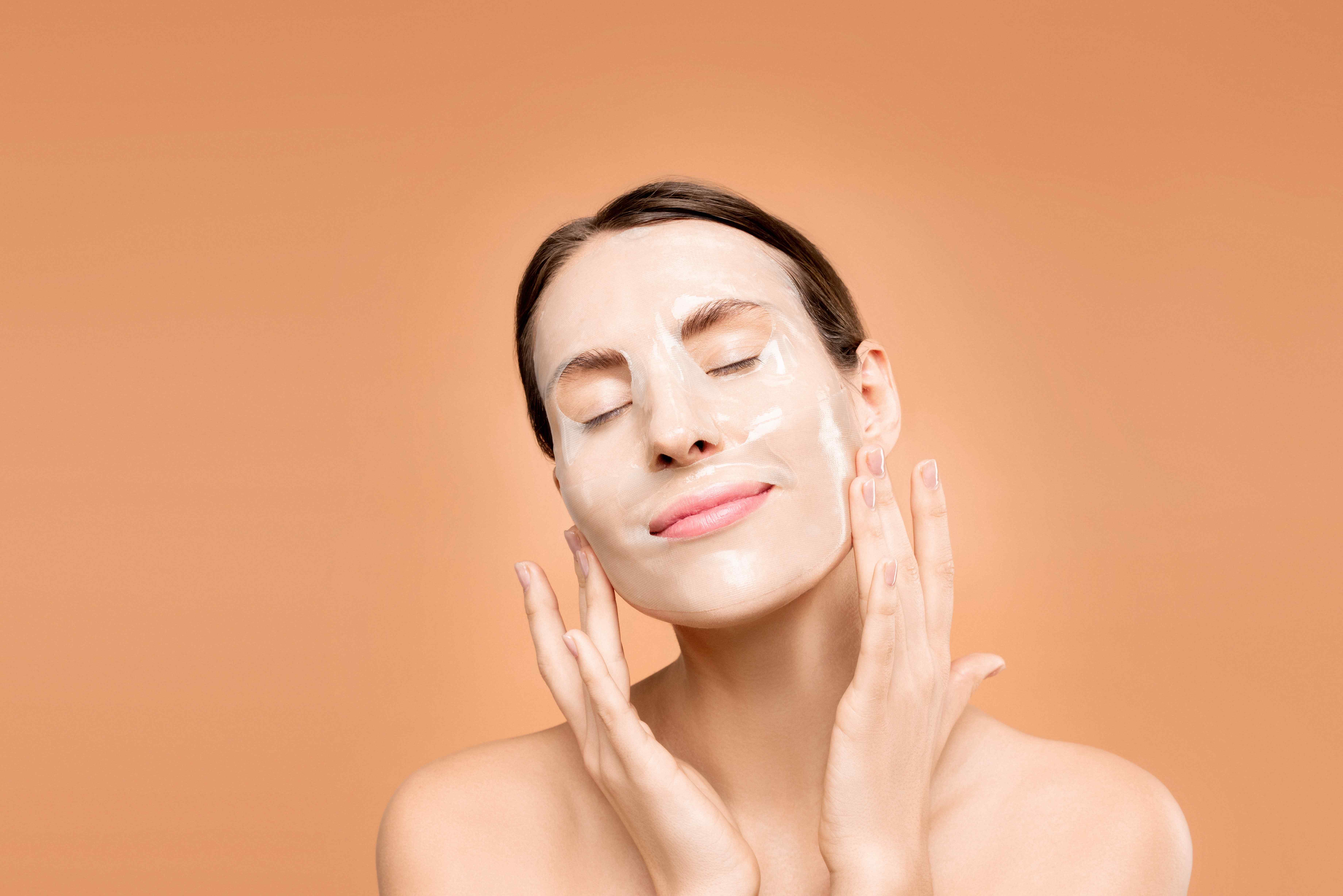 a woman doing a skin care routine