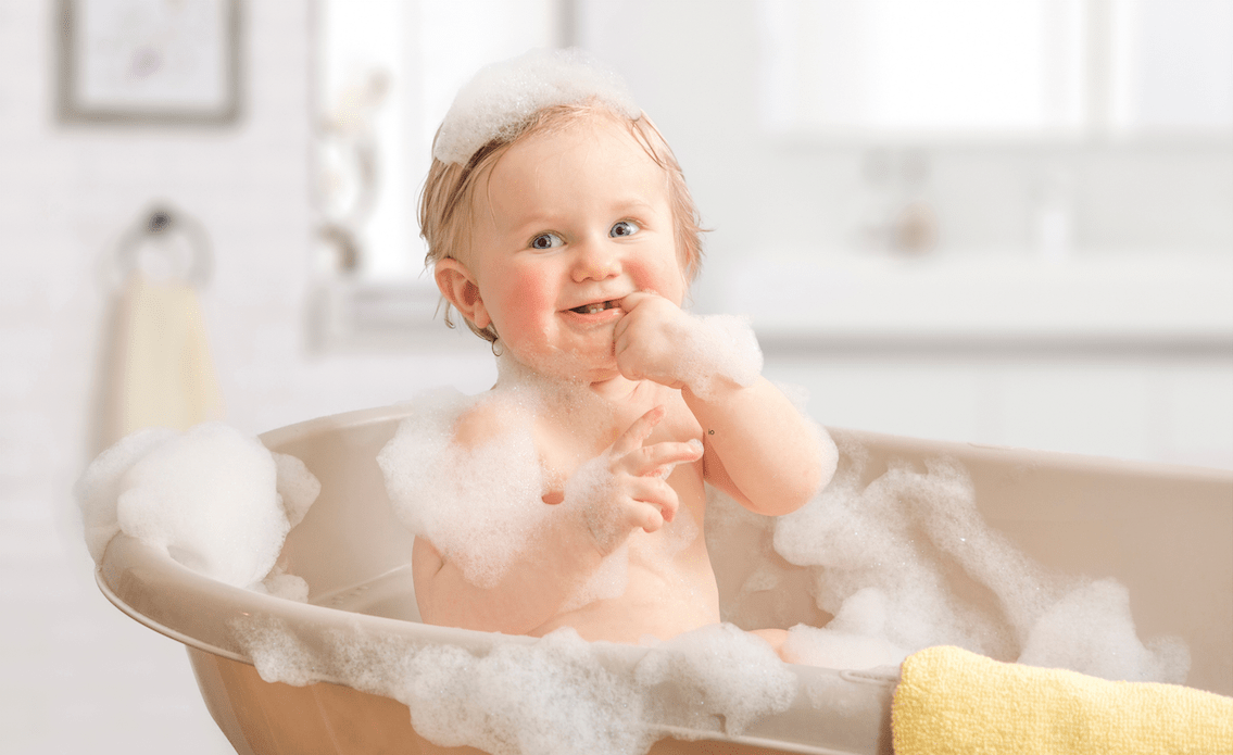 a baby taking a bath