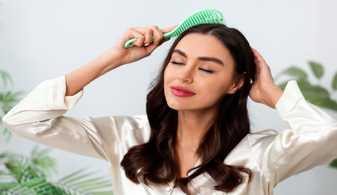 Woman brushing his hair and scalp