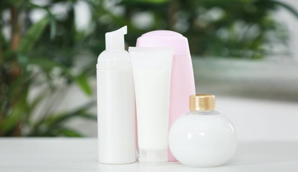 Cosmetic bottles blurred background