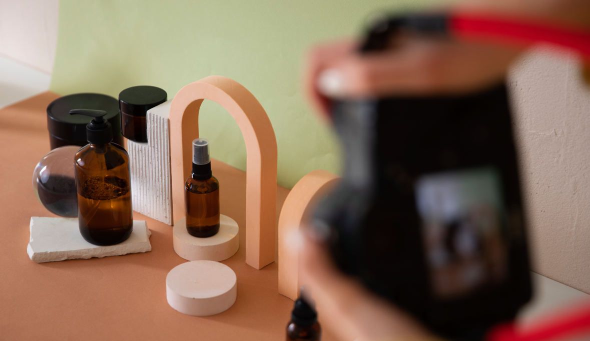 Woman taking a photo of beauty products